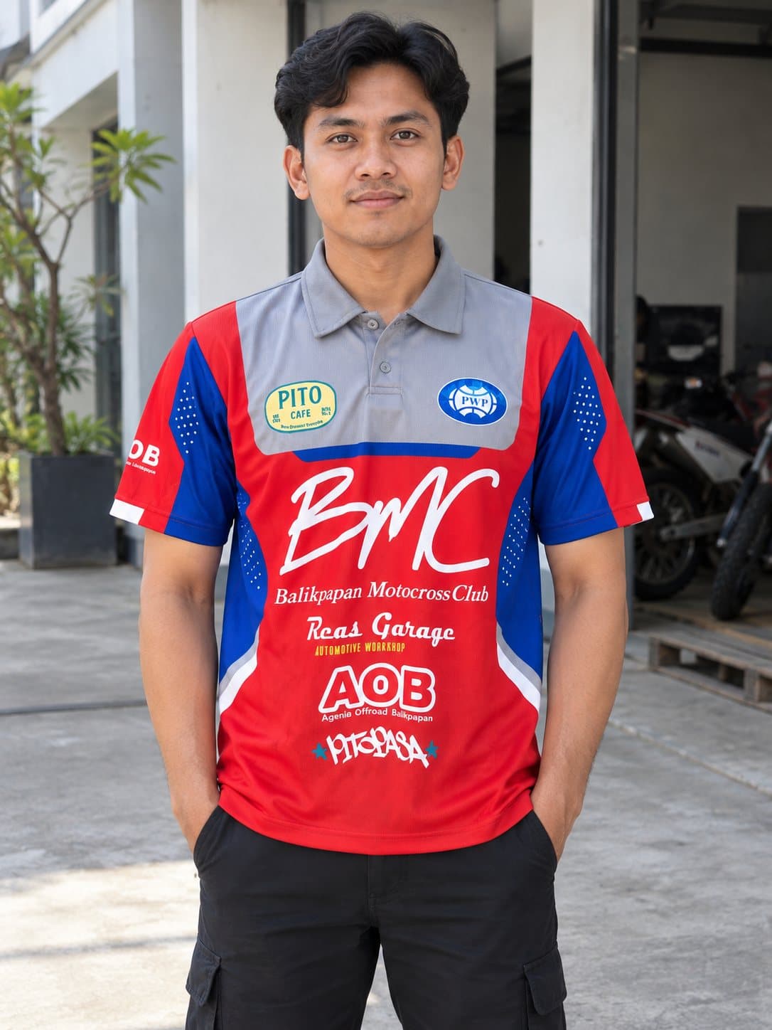 Jersey klub warna merah dan biru dengan desain full print